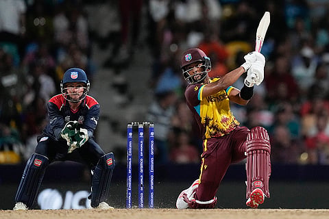 Shai Hope hits a six against USA